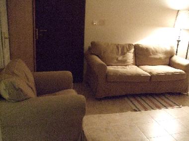 living room with comfortable sofa and armchair seating 3