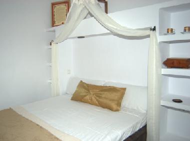gold room with double bed