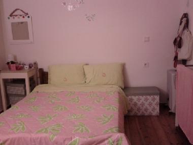 double bed in the woody attic