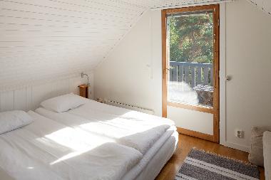 Room 3: Double bed 180 cm, baby kot, balcony