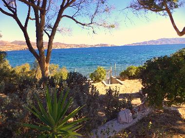 the entrance to the beach, just 1 min. walk from the house