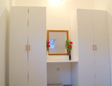 Twin bedroom also has two wardrobes