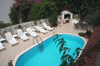 Pool with terrace and barbecue