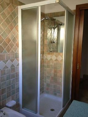 The shower in one of the bathrooms