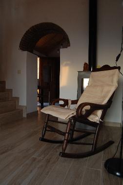 Rocking chair and fireplace 