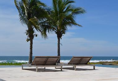 Extra roomy lounge chairs for sunbathing or reading (napping) in the shade