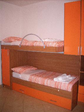 Lovely colorful twin bed room in new modern apartment in Marconia, Basilicata