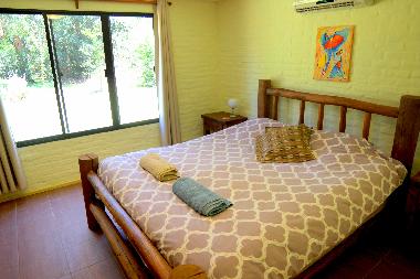 Master bedroom with king bed (equipped with air conditioner)