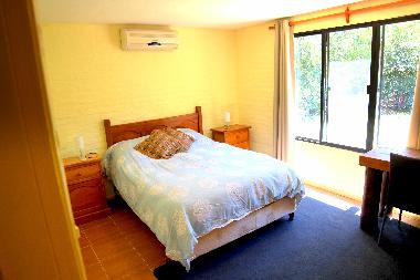 Queen size bedroom with desk (equipped with air conditioner)
