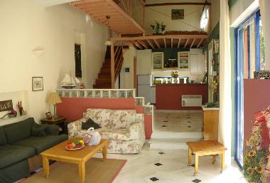 living room with double sofa bed (green sofa)