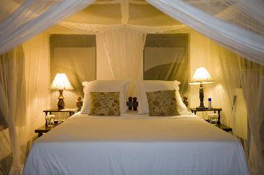 Amani Room luxurious bed