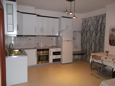 living room fitted kitchen