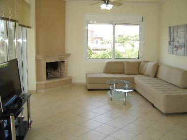 Apollo and Hermes livingroom.and satelite TV.  It is the same at each apartment