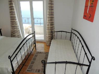 Bedroom with private balcony for 2 or 3 person