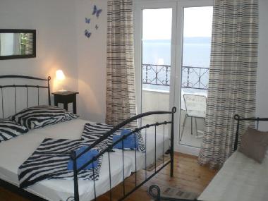 Bedroom with private balcony for 2 or 3 person