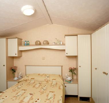Double Bedroom, view 2 and storage wardrobes