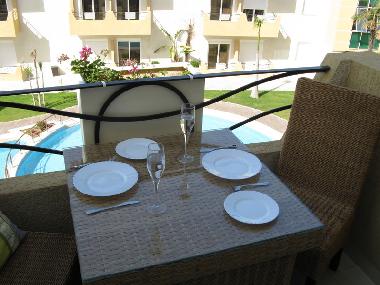 Relax while overlooking the magnificent pool setting
