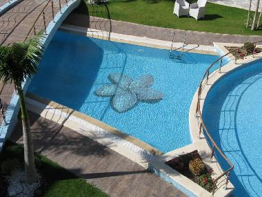 Stunning top floor apartment overlooking the pool