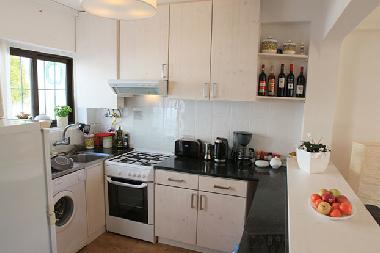 Kitchen with Fridge/Freezer, Waschingmachine, Gas oven etc.