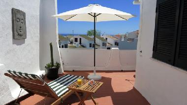 Large roof-terrace w. sea-view, (Off the frame: table, chairs)