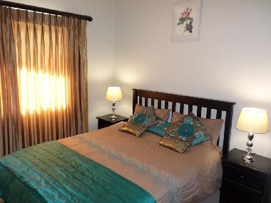 Bedroom 2 with built in cupboards