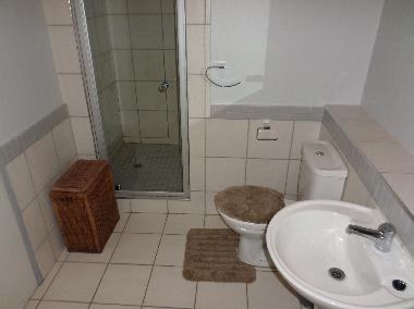 Bathroom with shower and bath