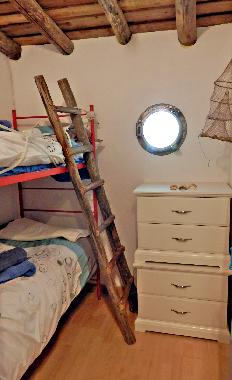 The nautically themed bunk bed room