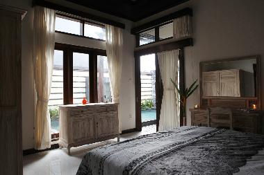 Main Bedroom with view to pool