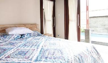 Second Bedroom with view to pool