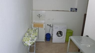 a cellar floor with laundry