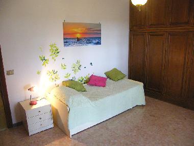 Room with two single beds