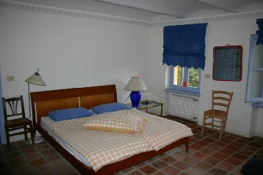 The first master bedroom: the room faces South and West