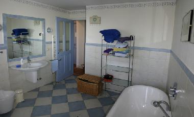 Bathroom on first floor with bath and telephone shower
