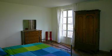 This master bedroom also has as access to a smaller balcony facing the Monviso mountain