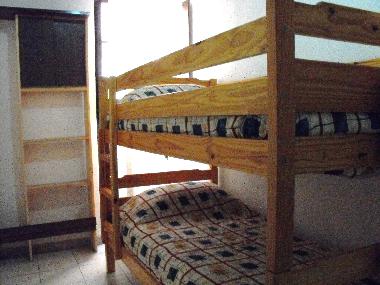 the room with bunk beds: the window