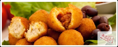 Arancine_A traditional snack made of Rice with Ragu or Ham and Cheese
