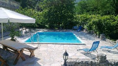The villa overlooks a large ~70sq m private infinity pool, a large garden (~700sq m), secluded, sea 