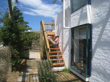 The enclosed garden at the Weaver and steps to the stoep.