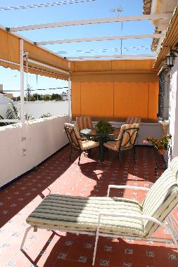 Extensive private terrace (30m2), very sunny (south facing) with awning and garden furniture.