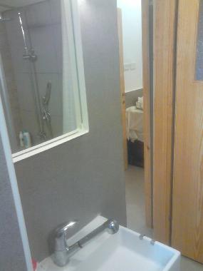 A sink in a toilet room!