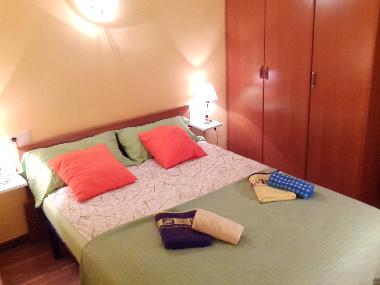 bedroom I: 1 double bed, wardrobe, bedside tables