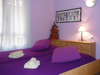 bedroom II: 2 single beds, wardrobe, beside table