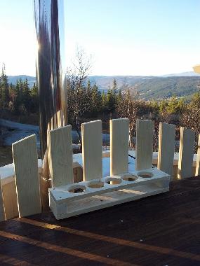 Wooden tun with part of view