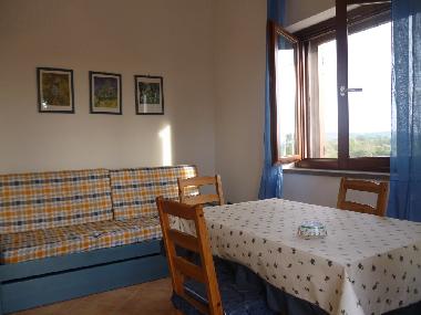 The dining table anda the pull out sofa