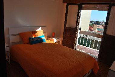 Master bedroom with balcony