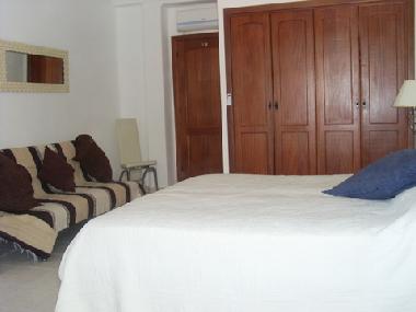 the bedroom has a sofa bed which can provide an extra sleeping place