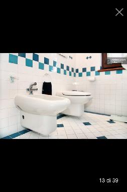 Bathroom with shower with window on balcony