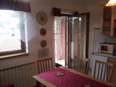 Dining room/kitchen with teraz apartment 2