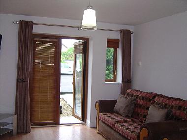 Patio Doors leading to gated car park