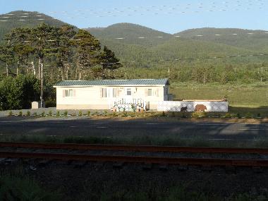 Front of house, patio on right